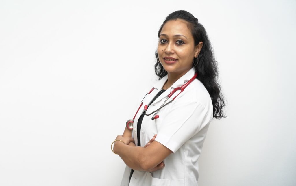 Closeup shot of a South Asian female doctor posing with her hands crossed